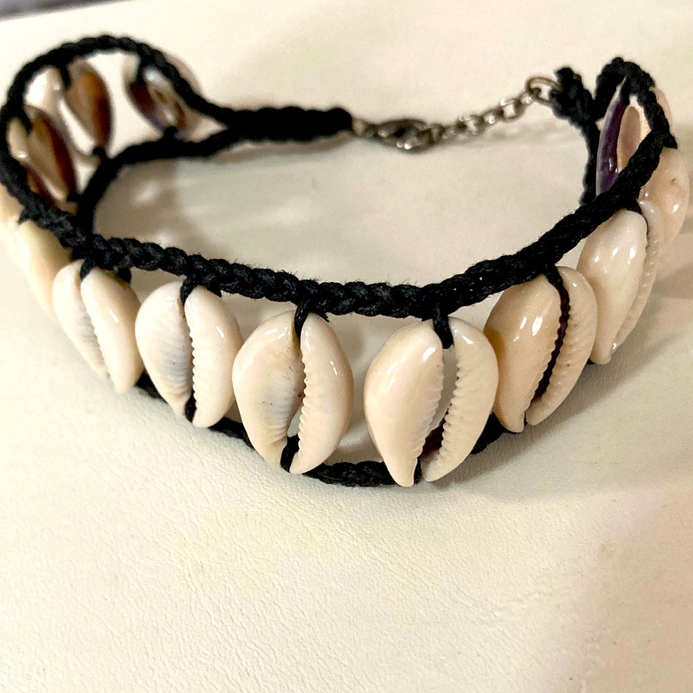 Shell ankle bracelet w dk brown twine.  Gently owned. Bme2766